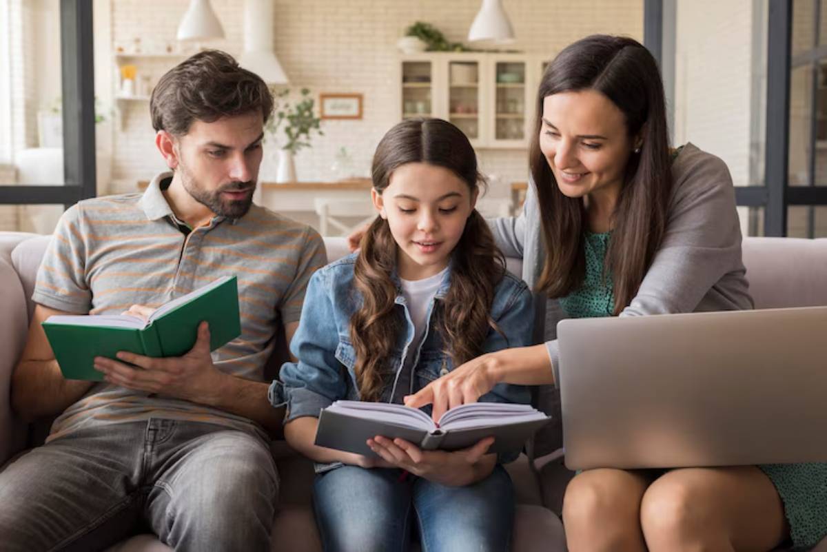 A family sits together on a couch, reading books and engaging in learning activities in a bright, cozy living room.